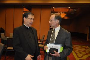 Quiner talks with Fr. Frank Pavone